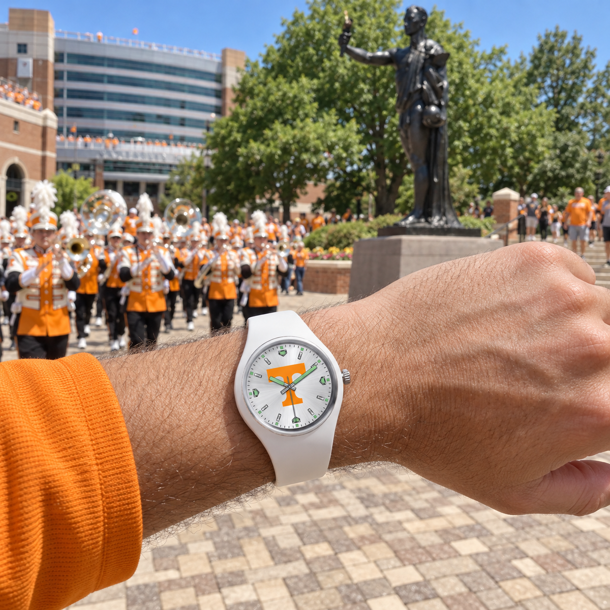 The band marches right behind - Tennessee Volunteers watch